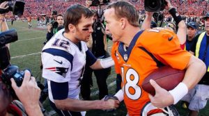 Peyton Manning of the Denver Broncos and Tom Brady of the New England Patriots meet after the AFC Championship game in Denver
