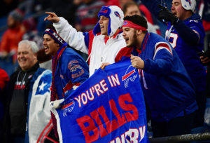 Buffalo Bills fans celebrating in the stands as a part of Bills Mafia